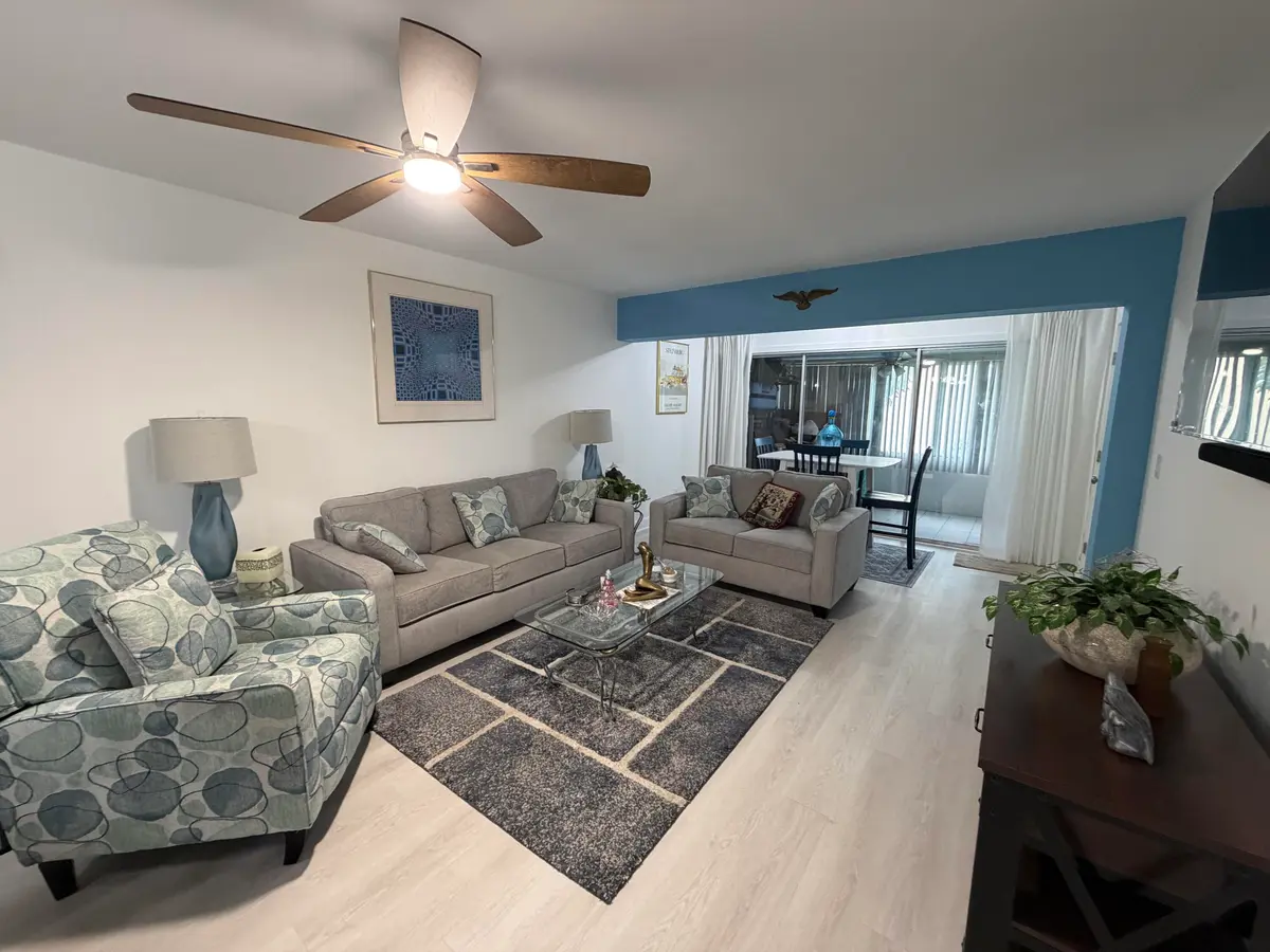 Living room at 1111 Lemon Tree Terrace 104, Delray Beach