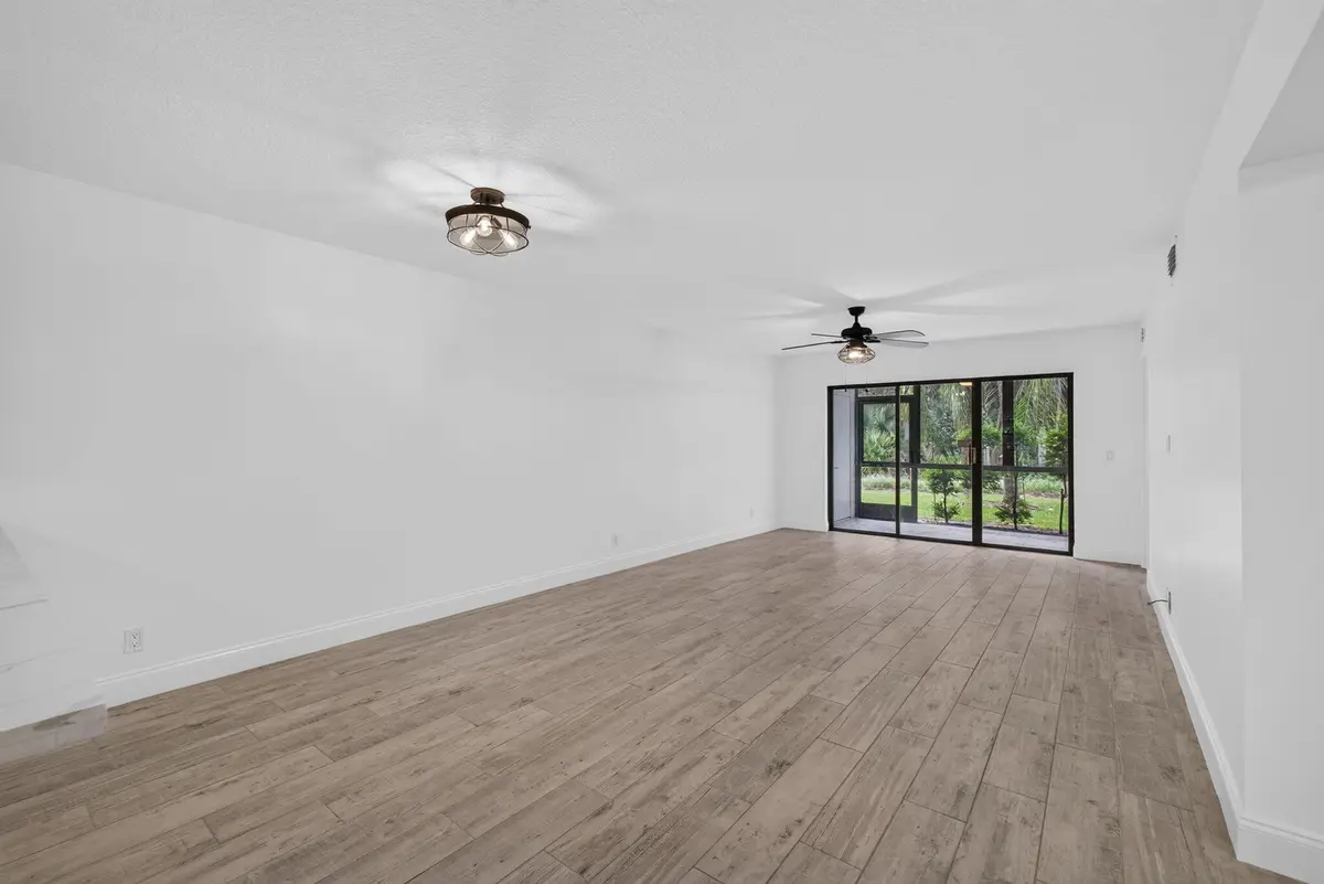 Family Room at 1701 Sabal Ridge Circle D, Palm Beach Gardens