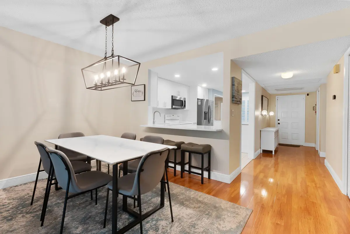 Dining Area, Kitchen & Entry at 4007 N Cypress Drive 208, Pompano Beach