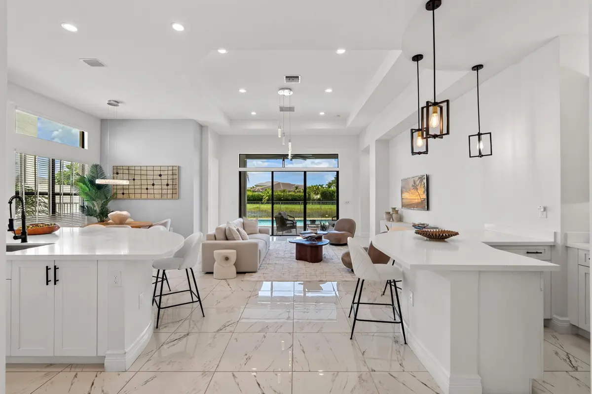LIVING_ROOM_STRAIGHT_TO_POOL at 9889 Bozzano Drive, Delray Beach