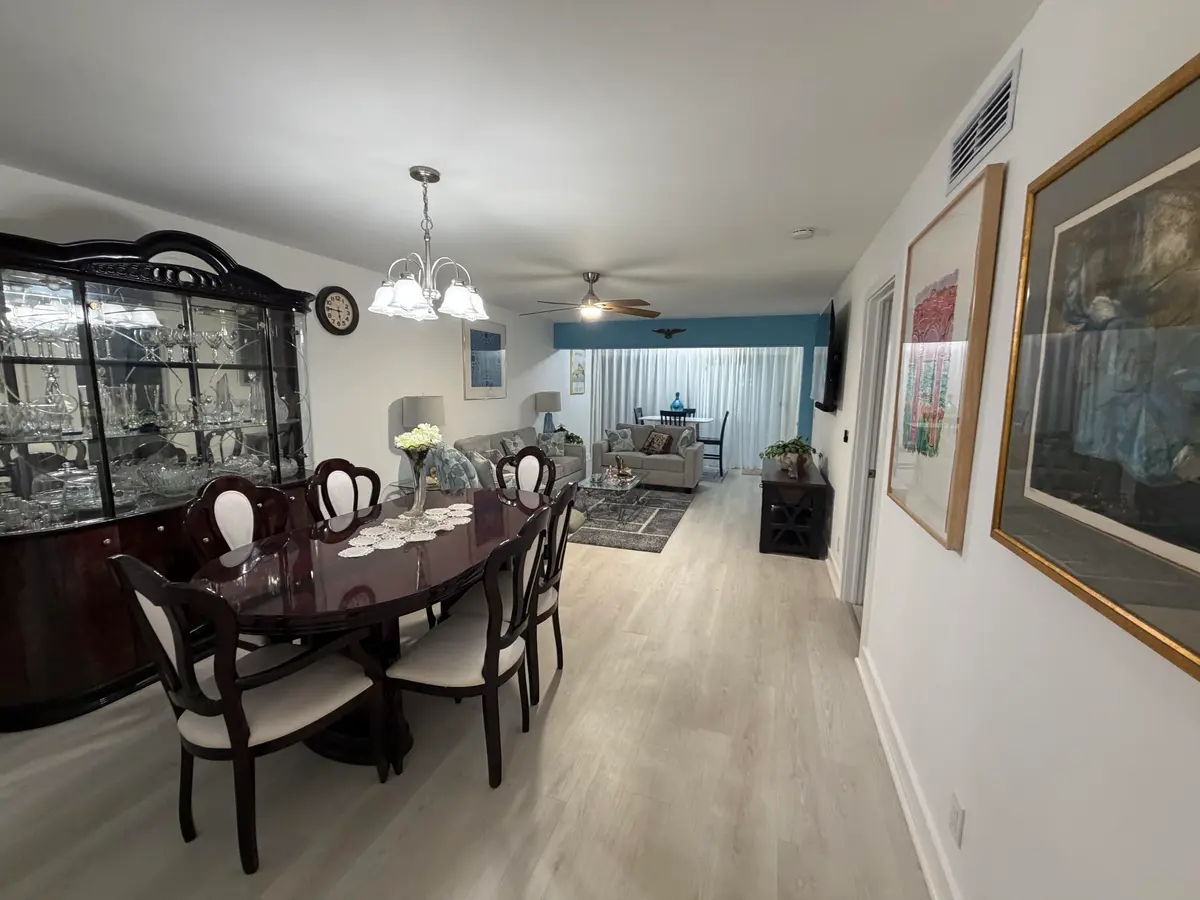 Dining area to living room at 1111 Lemon Tree Terrace 104, Delray Beach