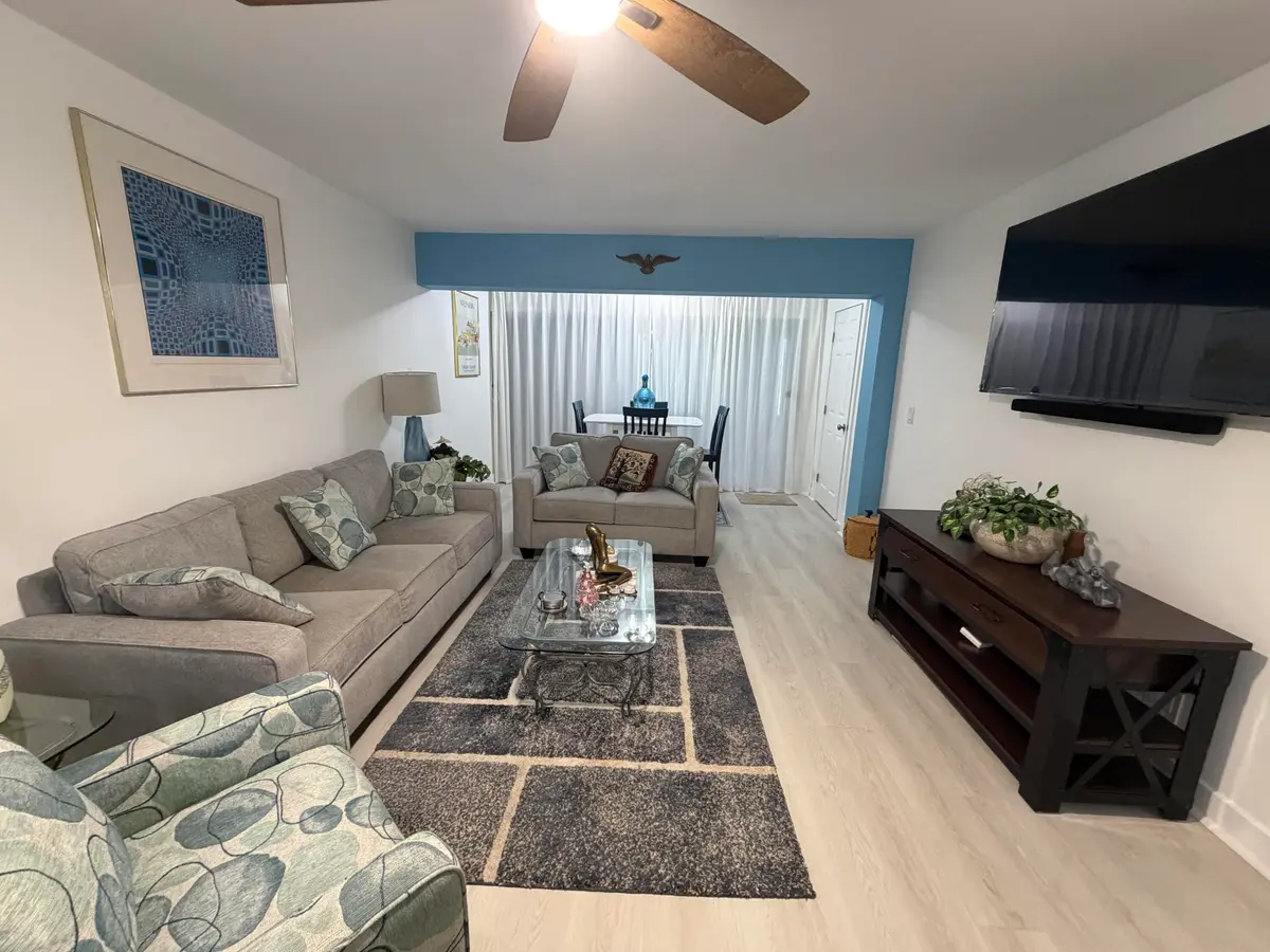 Living room at 1111 Lemon Tree Terrace 104, Delray Beach