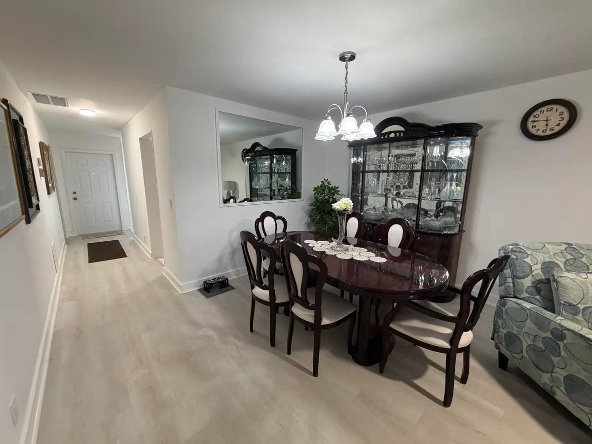 Dining area at 1111 Lemon Tree Terrace 104, Delray Beach