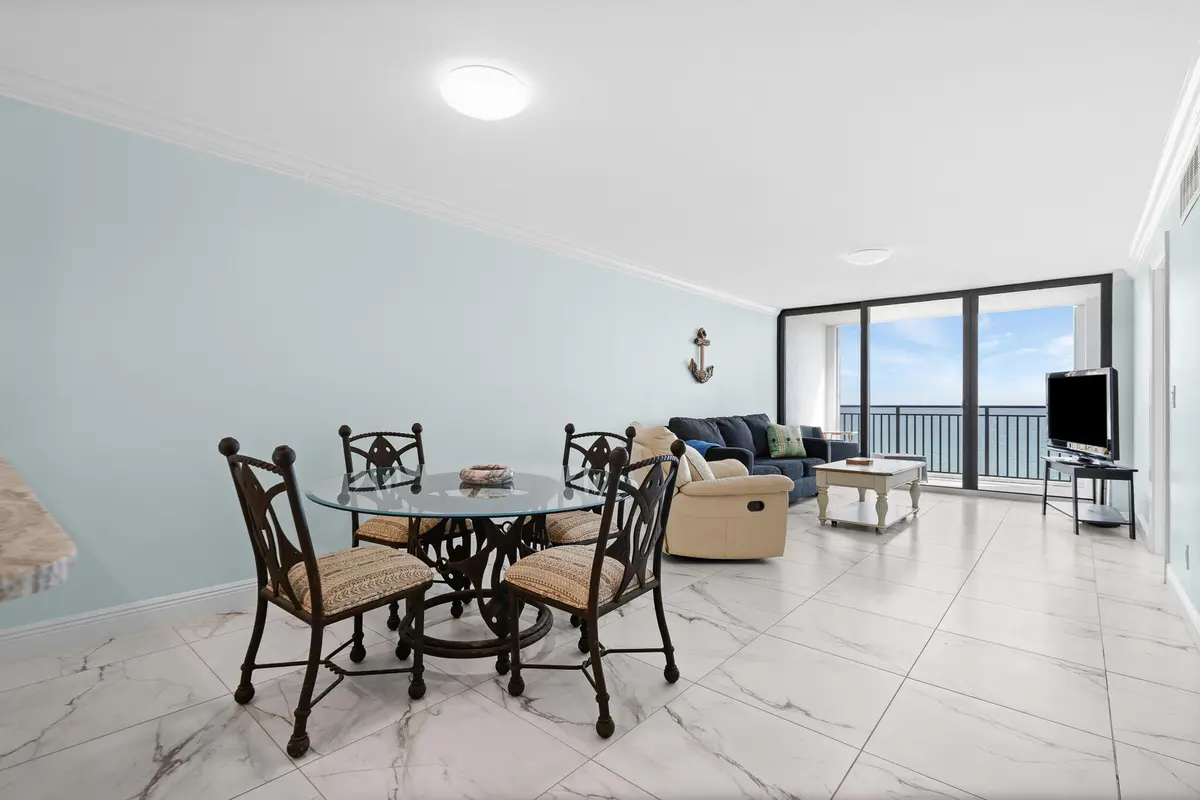 Dining and Living space at 10102 S Ocean Drive 705A, Jensen Beach