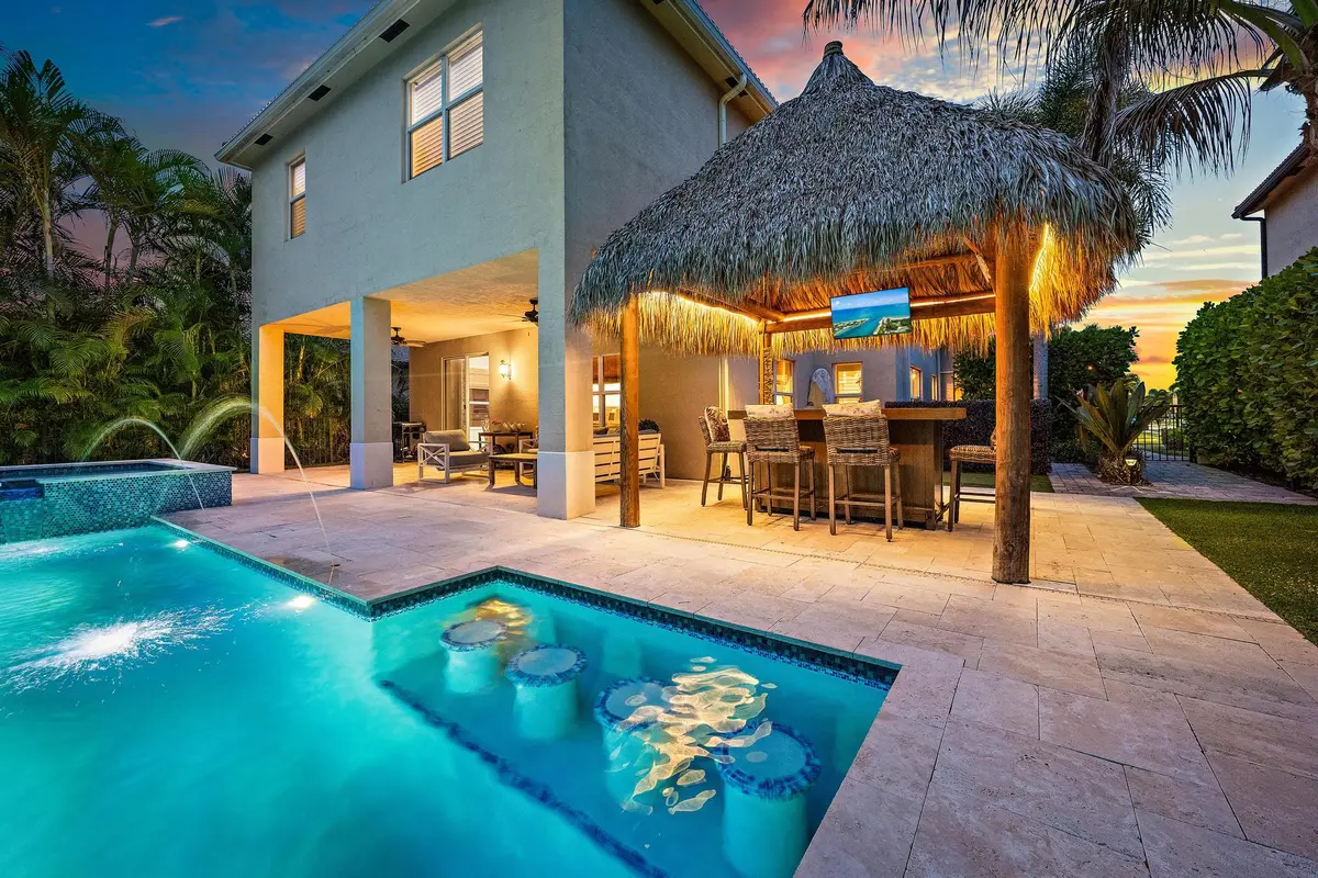 Pool & Back Exterior at 148 Behring Way, Jupiter
