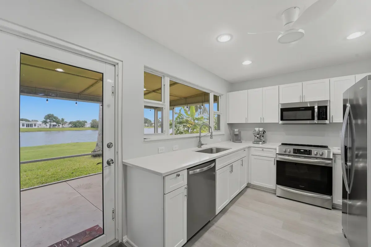 Kitchen With Lake View at 2201 SW ROMA WAY, Boynton Beach