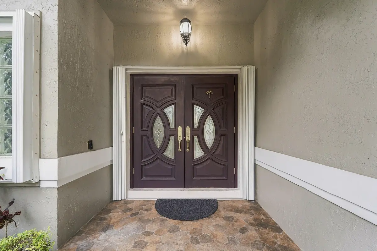 04_exterior entry at 6211 NW 58th Way, Parkland