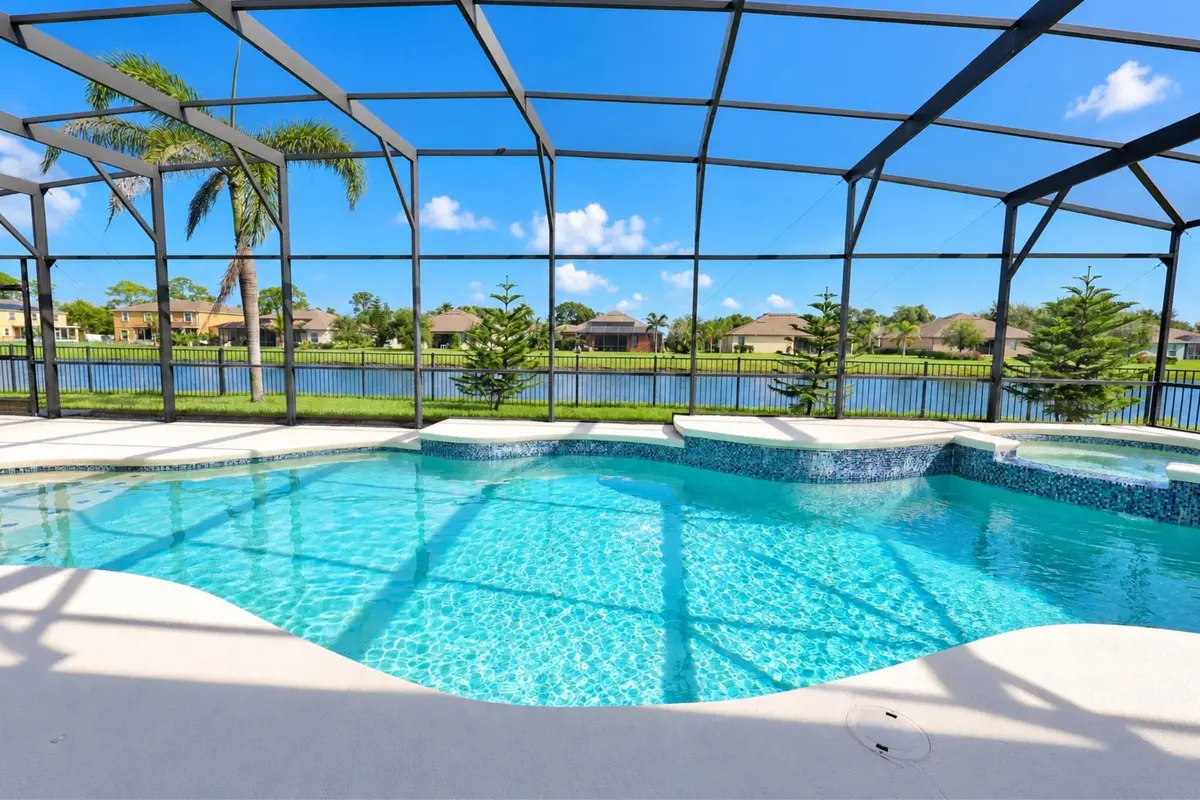 Sunny Lanal Overlooking the lake at 6460 Palm Place, Vero Beach