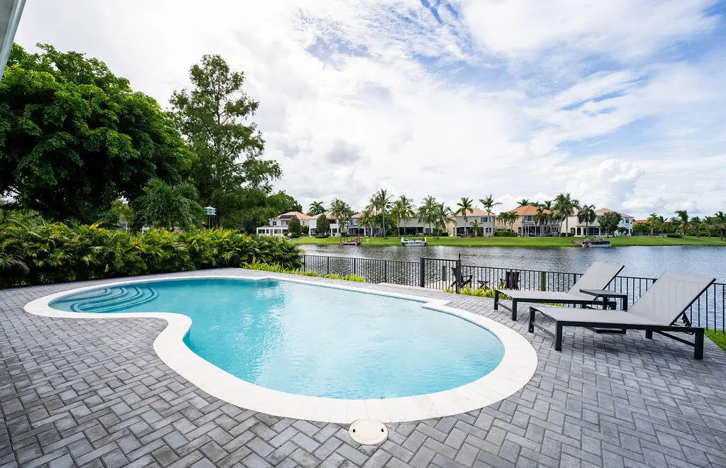 01_Pool and lake at 12657 White Coral Drive, Wellington