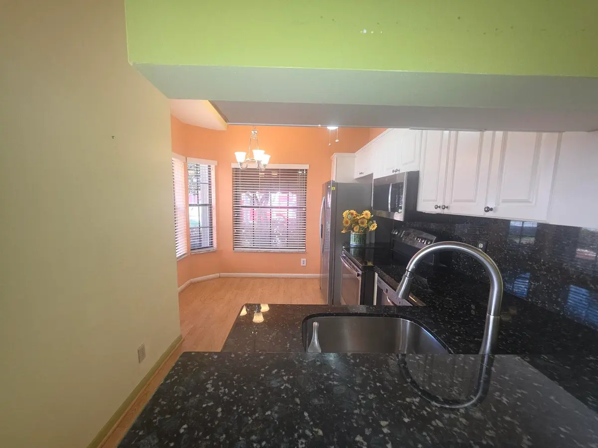 Kitchen view at 7852 Lexington Club Boulevard B, Delray Beach