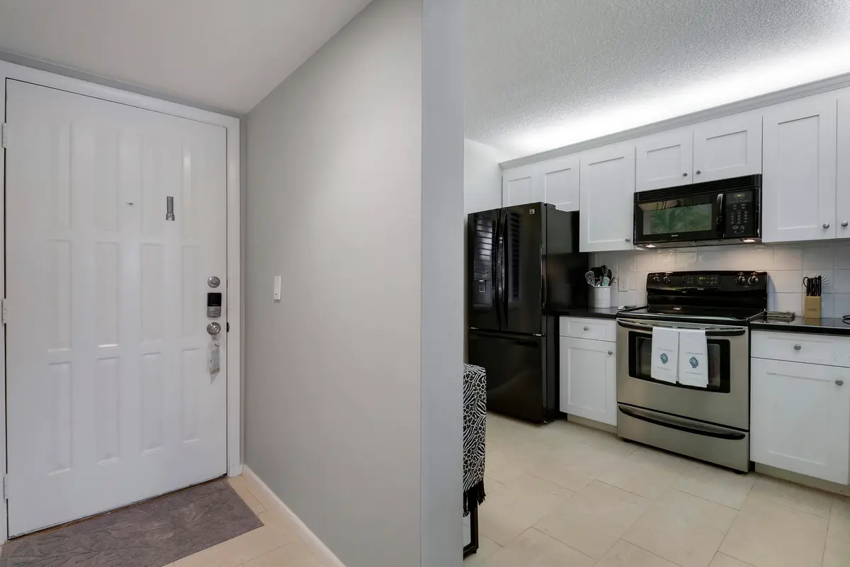 Foyer at 1601 Marina Isle Way 202, Jupiter