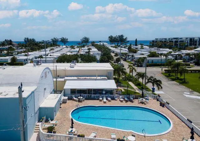 swimming pool area at 15 HIBISCUS Drive H, Briny Breezes