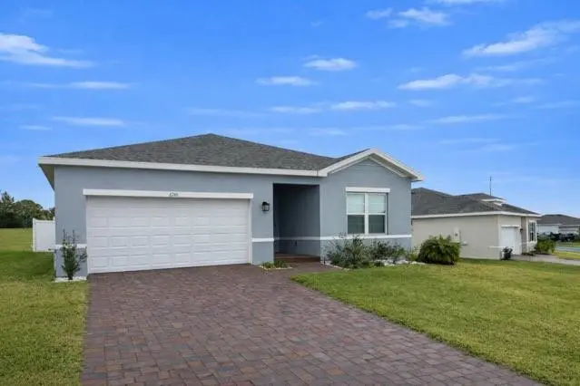 Front of home 2 car garage at 6740 RUMINE Circle, Vero Beach