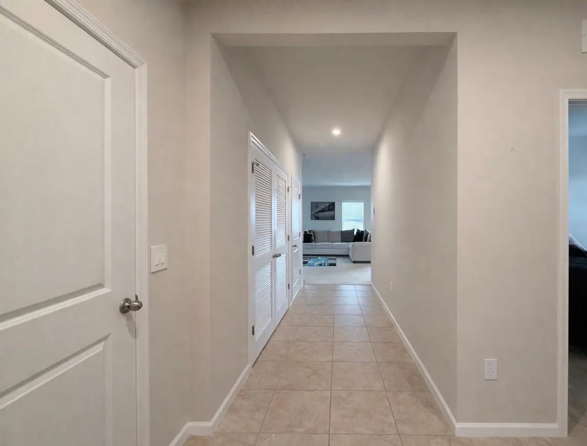 Hallway to living room at 6740 RUMINE Circle, Vero Beach