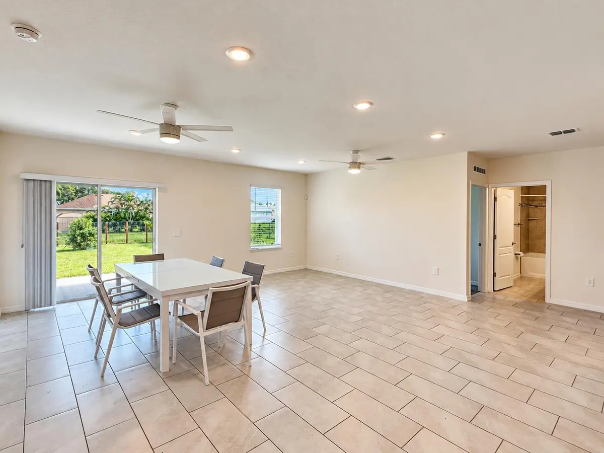 Bright Open-Plan Dining Room at 1025 SW SARTO Lane, Port St. Lucie