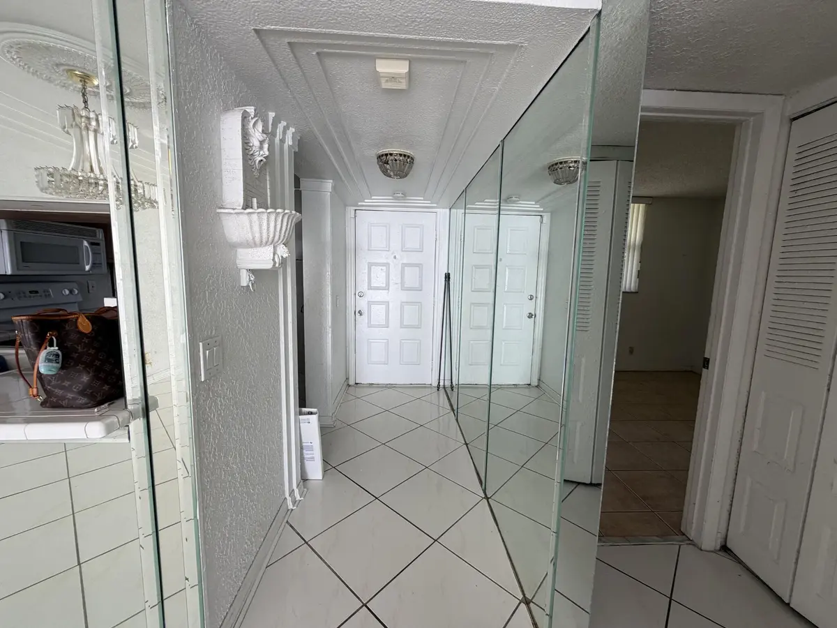 Hallway at 112 LAKE EMERALD Drive 203, Oakland Park