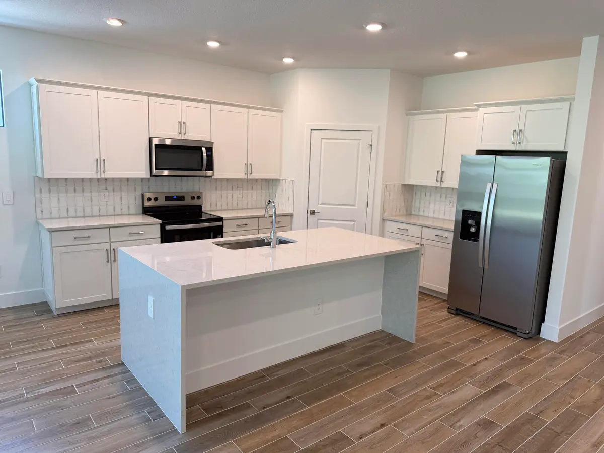 Delaney Kitchen with Coastal package at 6551 SE Park Trace Drive, Stuart