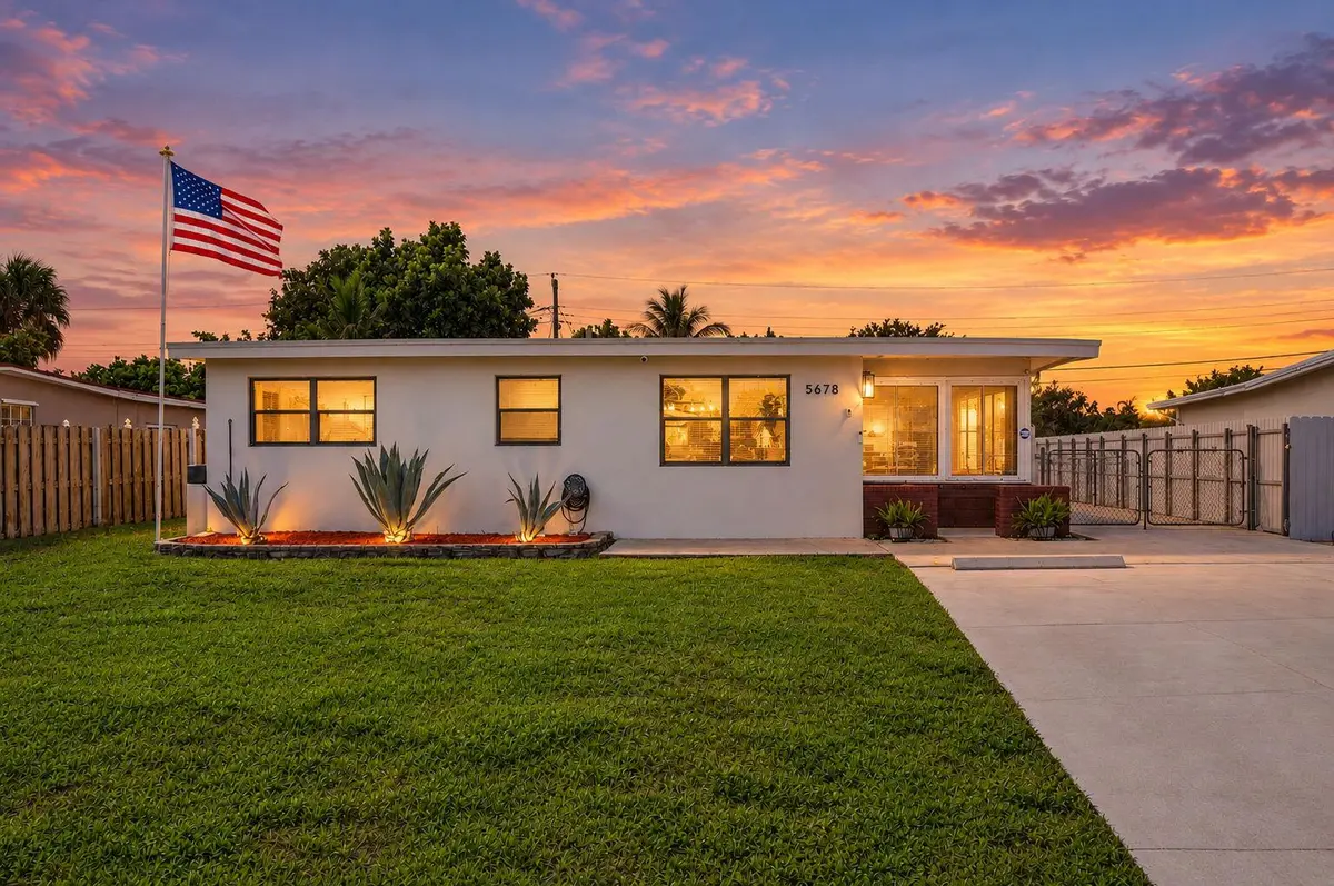 2-web-or-mls-twilight (1) at 5678 Cinnamon Drive, West Palm Beach