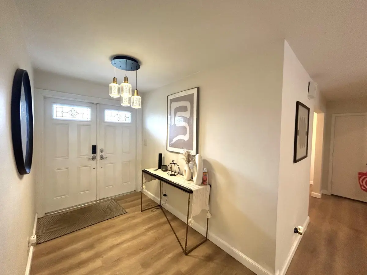 560 NEW foyer at 560 S LAKE DASHA Drive, Plantation