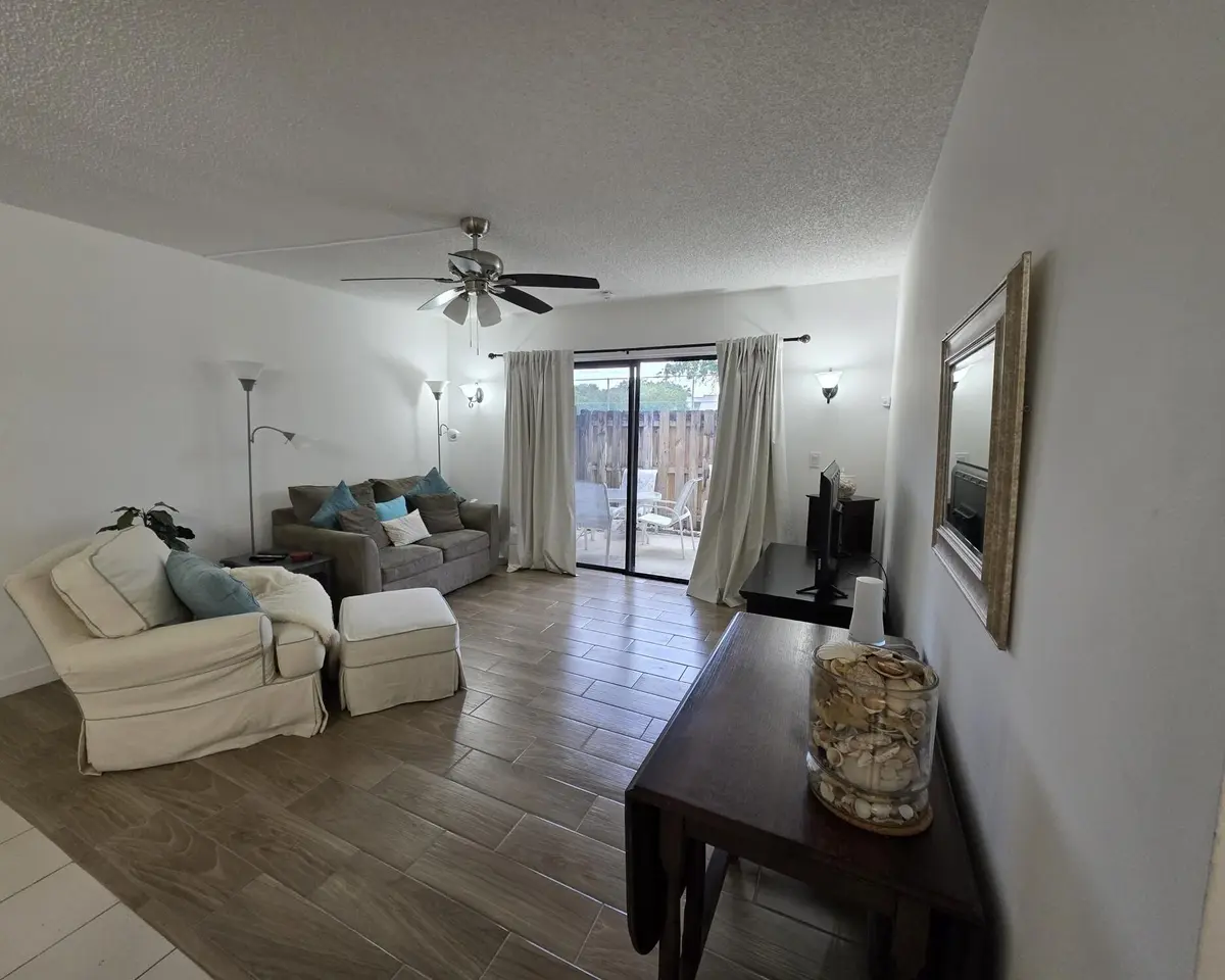 Family Room patio view at 3402 Gardens E Drive 14A, Palm Beach Gardens