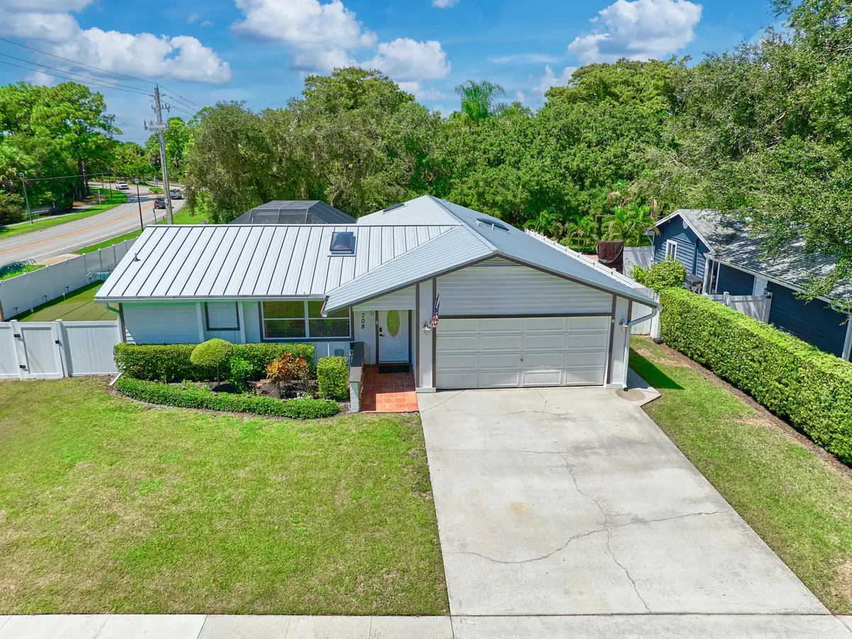 Front at 708 Weldwood Road, Jupiter