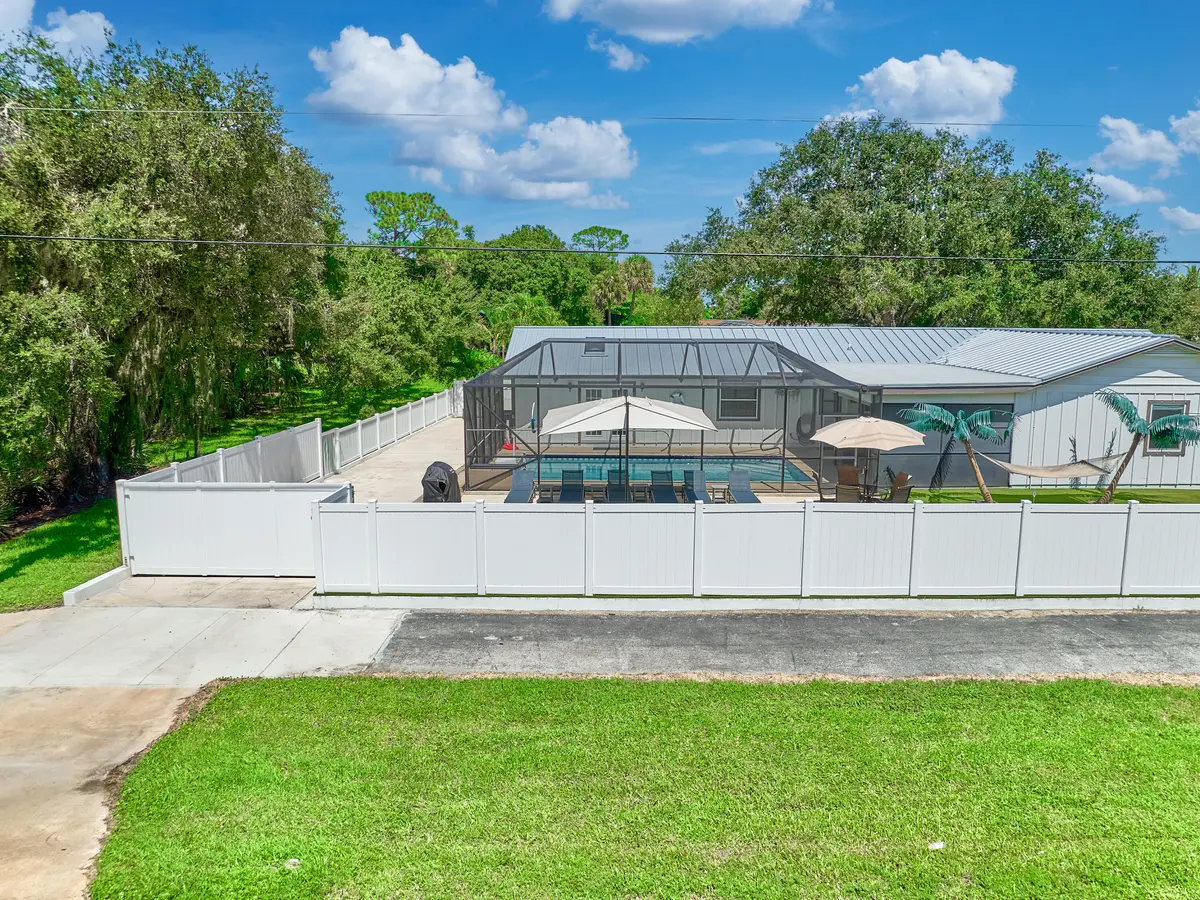 Side & Electronic Gate at 708 Weldwood Road, Jupiter