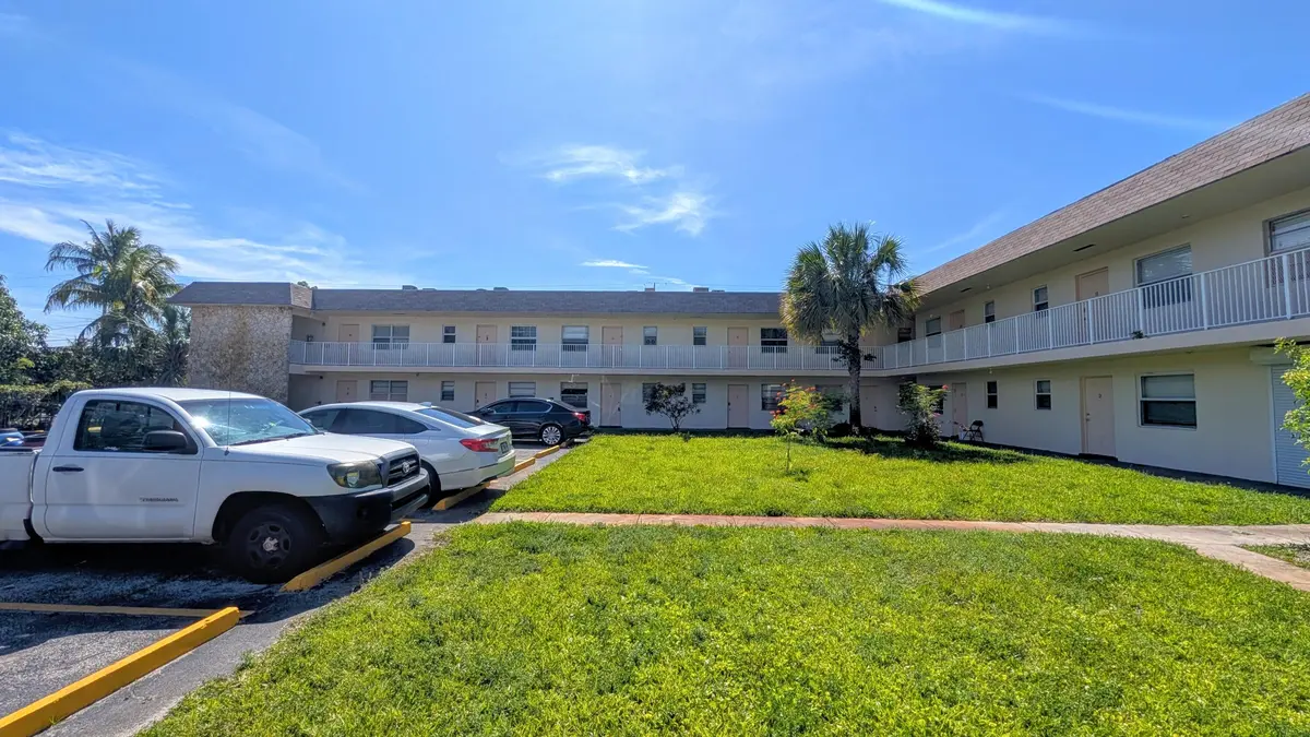 Exterior front & parking at 2301 SE 4th Street 15, Boynton Beach