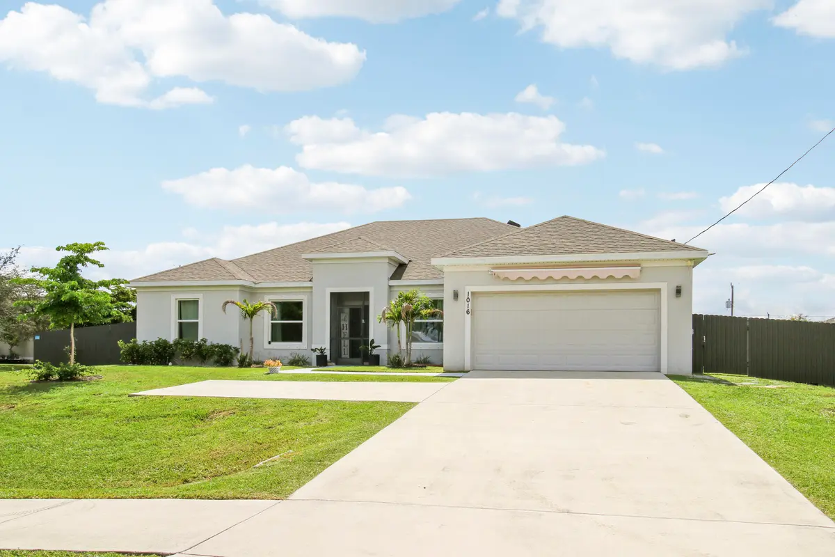 Front Exterior and Driveway at 1016 SW Paar Drive, Port St. Lucie
