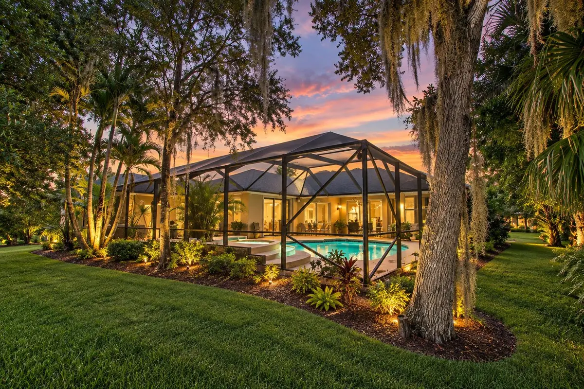 pool twilight at 2108 Winding Creek Lane, Fort Pierce