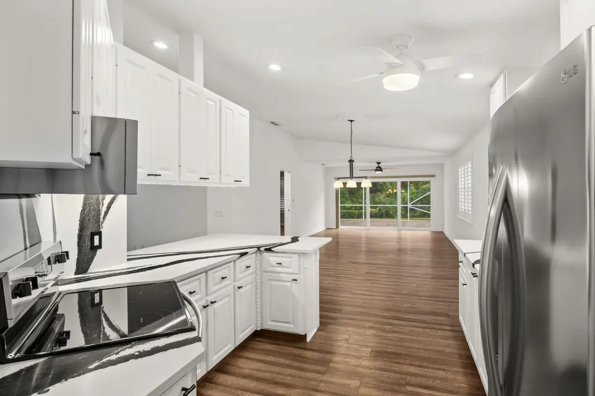 extended living area from kitchen at 918 SW Balmoral Trace, Stuart