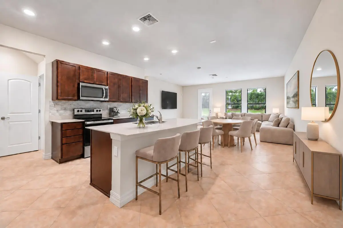 2488 staged lr dr kitchen at 4488 Appleton Circle, Oakland Park