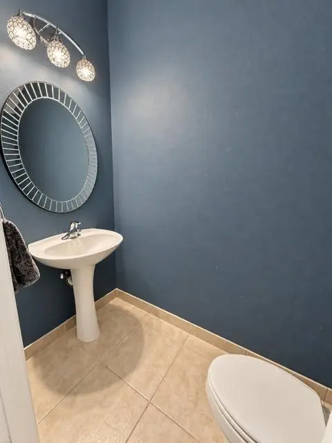 Guest Bathroom Downstairs at 1571 SE HAMPSHIRE Way 102, Stuart