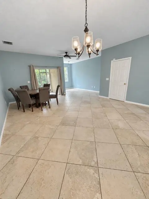 Dining Area/Living Room Area at 1571 SE HAMPSHIRE Way 102, Stuart
