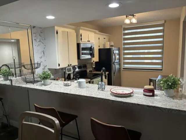 alvarez3 at 1707 WHITEHALL Drive 105, Davie