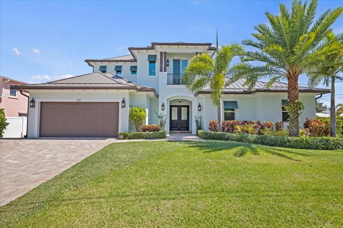 Front View of this Incredible Home! at 205 Body Court, Jupiter