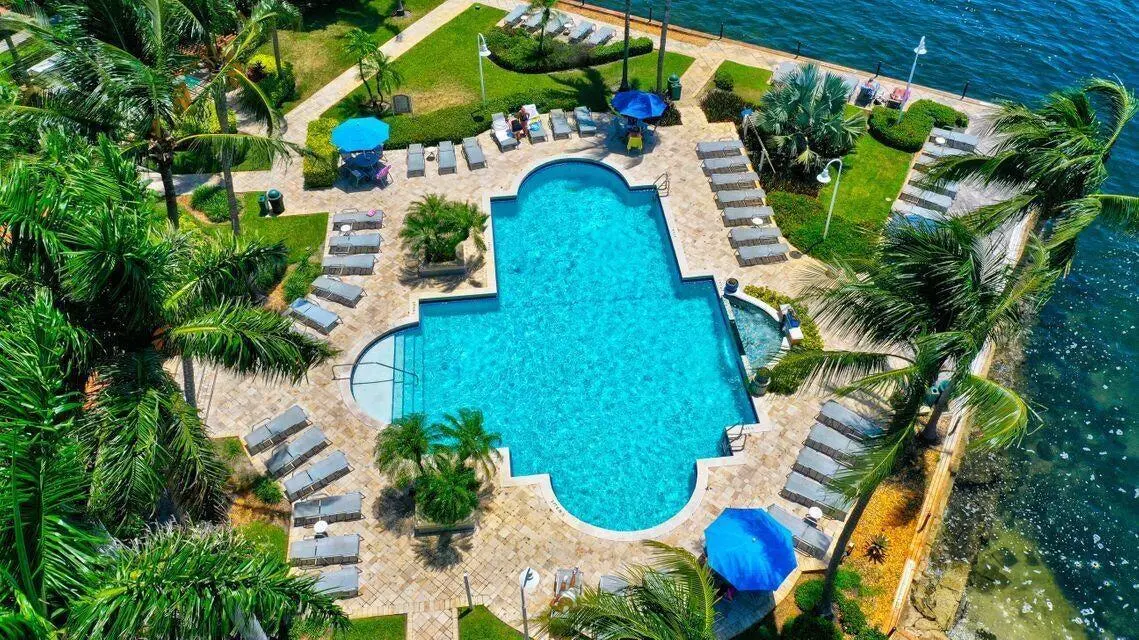 yacht club main pool waterfront 7.24 at 103 Yacht Club Way 104, Hypoluxo