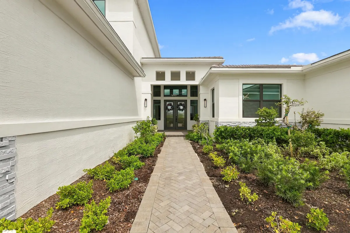 Landscaped Private Courtyard Entrance at 12984 SW Shinnecock Drive, Port St. Lucie