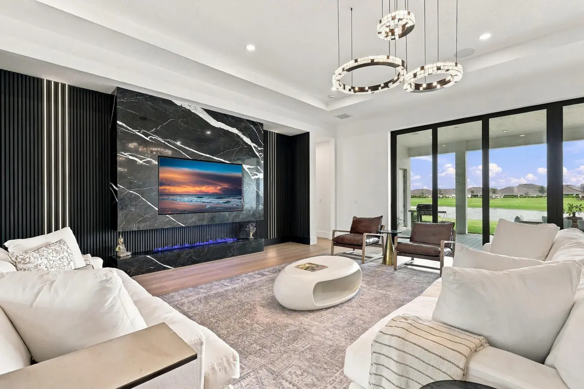 Feature Wall, Fireplace and Lake Views at 12984 SW Shinnecock Drive, Port St. Lucie