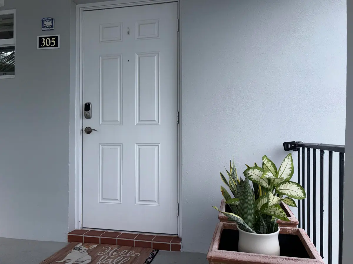 11 CC Front Door at 10 COLONIAL CLUB Drive 305, Boynton Beach