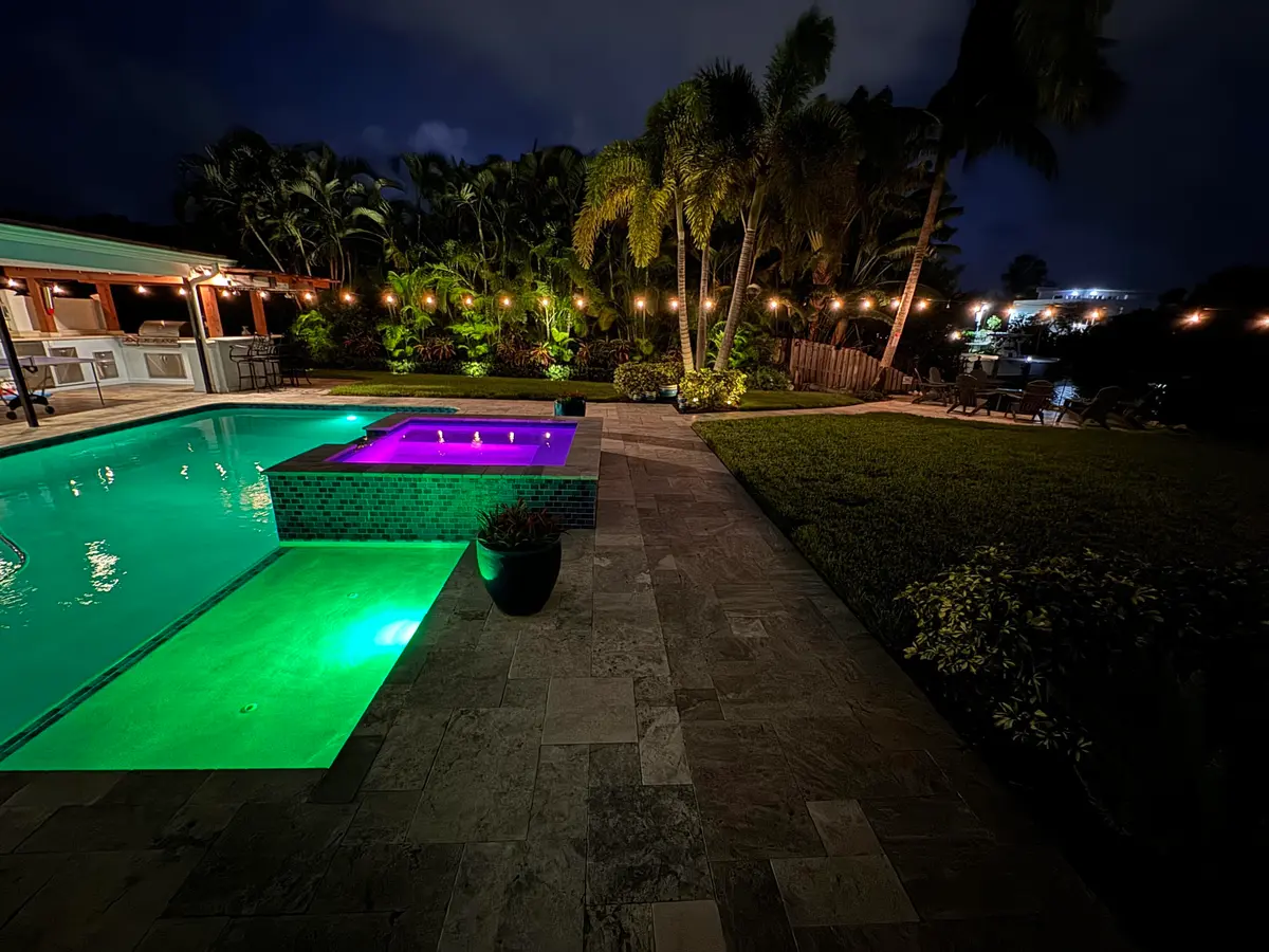 Evening Pool Yard at 730 CAMINO LAKES Circle, Boca Raton
