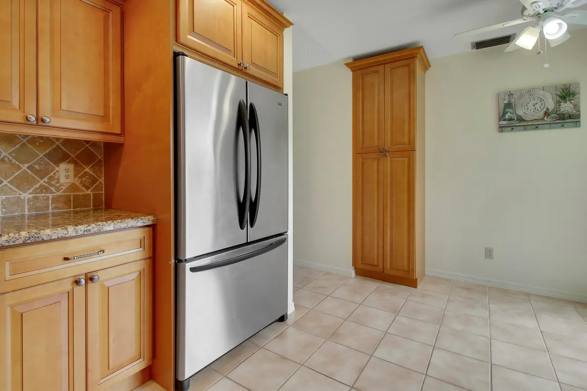 kitchen w breakfast nook at 6807 SE Yorktown Drive, Hobe Sound