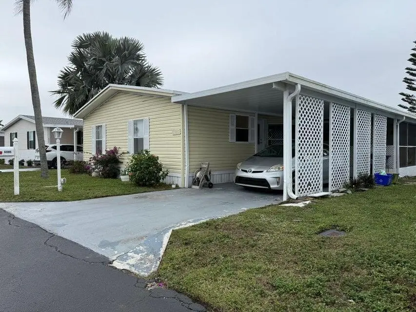 20251115163954343381000000-o at 6085 Seashore  Drive, Atlantis