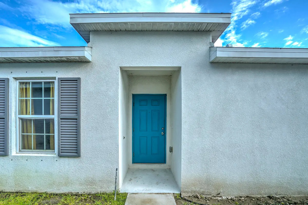 Side Door Entry Way at 337 Raspberry Road, Fort Pierce
