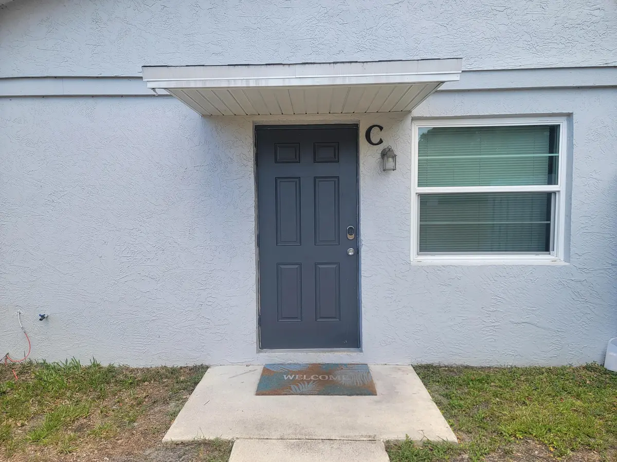 2001 Oleander Blvd Apt C Front Door at 2001 Oleander Boulevard C, Fort Pierce