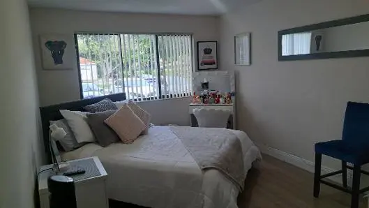 master bedroom at 9088 W Atlantic Boulevard 515, Coral Springs