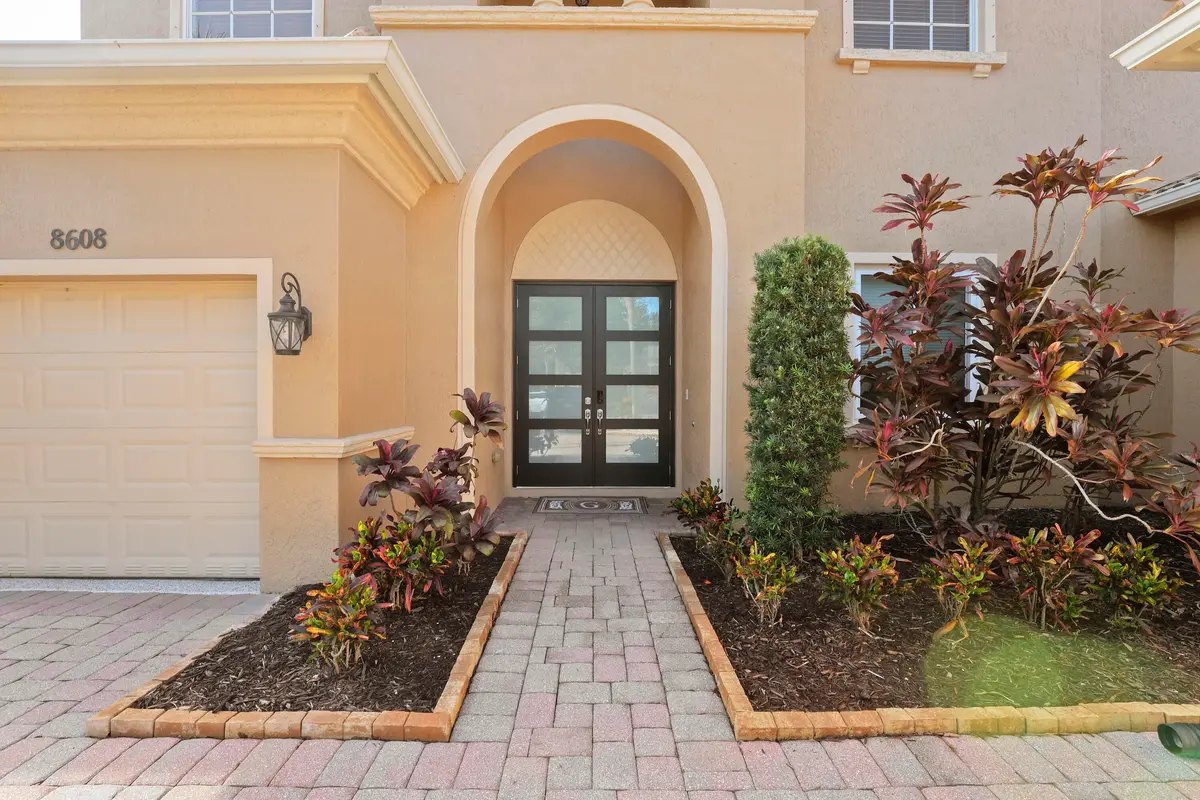 Front Impact Door at 8608 PALISADES LAKE Drive, West Palm Beach