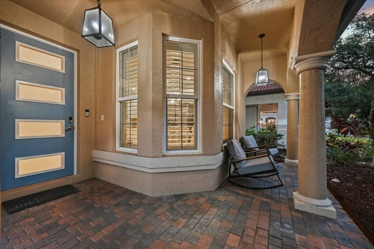 Inviting Porch Entryway at 443 Pumpkin Drive, Palm Beach Gardens