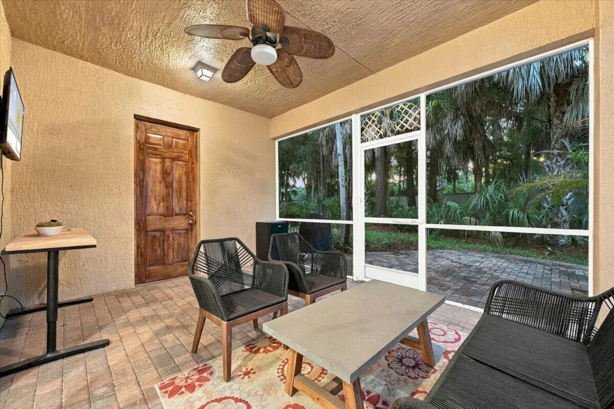 Screened-In Extended Patio at 443 Pumpkin Drive, Palm Beach Gardens
