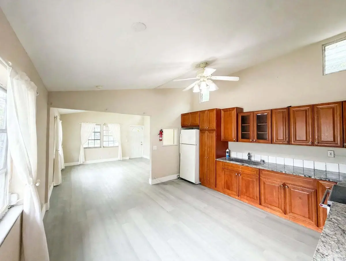 IMG_8017-remove-the-window-ac-add-white- at 216 NW 12TH Court 3, Pompano Beach