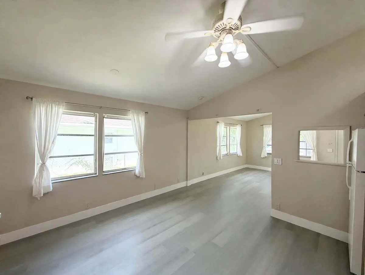 IMG_8018-remove-the-window-ac-add-white- at 216 NW 12TH Court 3, Pompano Beach